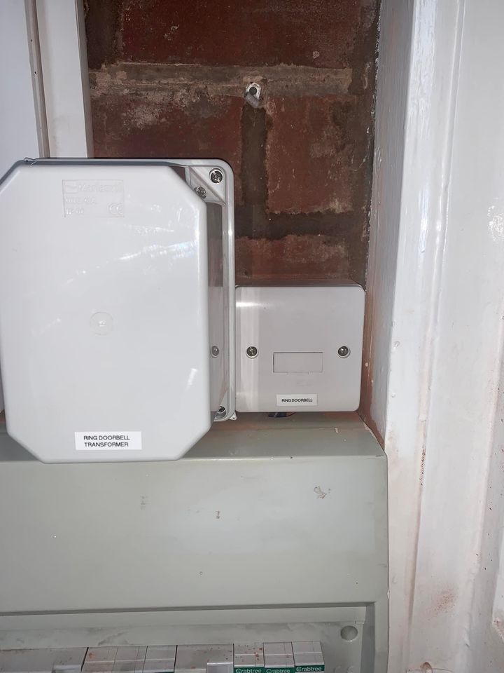 Doorbell control box with cover attached